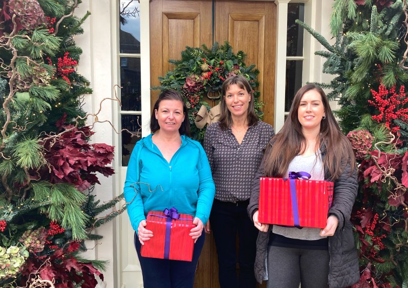 Jersey Skipton staff presenting Christmas presents 