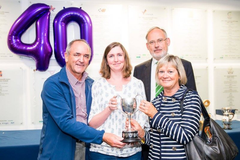 group holding Swimarathon Trophy 