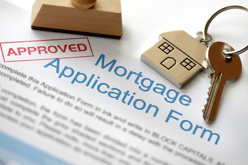 House keys on mortgage application form