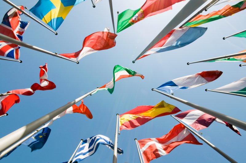 Upwards view of international flags