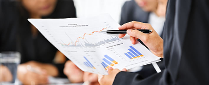 Person holding finance report