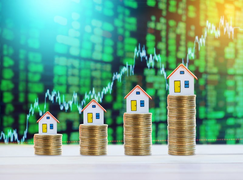 rising pennies with small houses on top