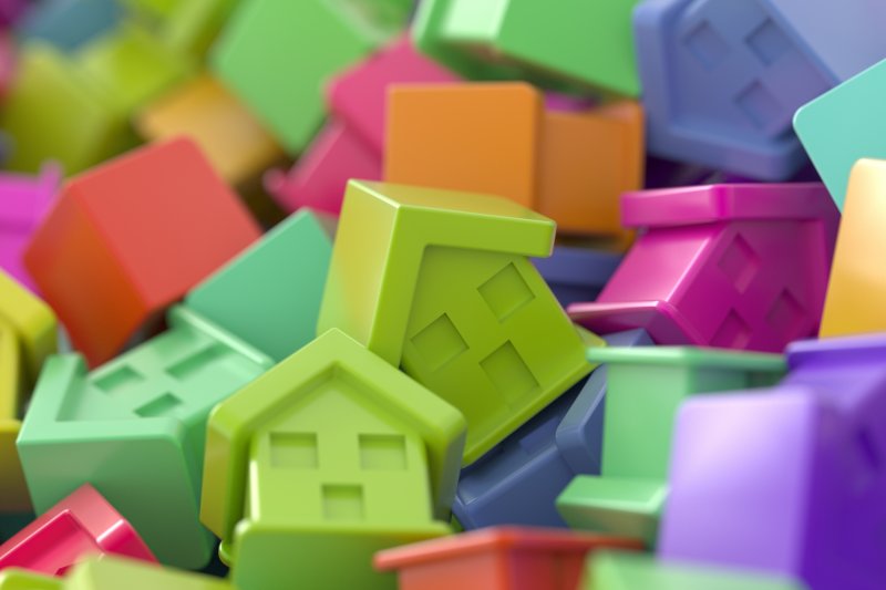 pile of coloured acrylic houses