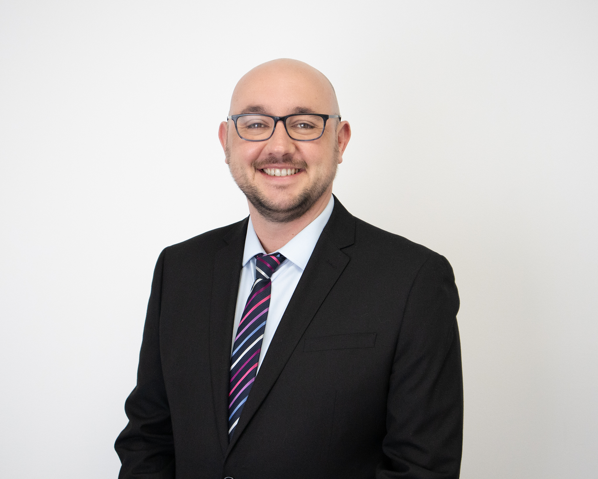 Sean Gauvain in a suit